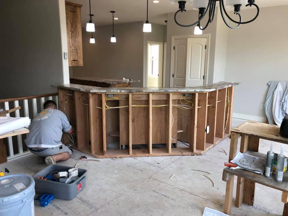 Electrician performing residential maintenance